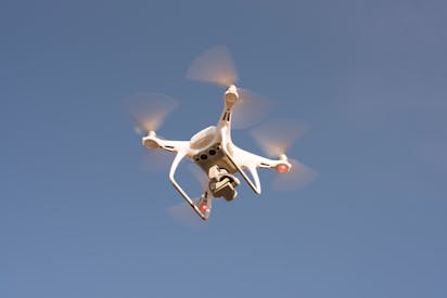 Low Angle Shot Of Drone Flying In The Sky
